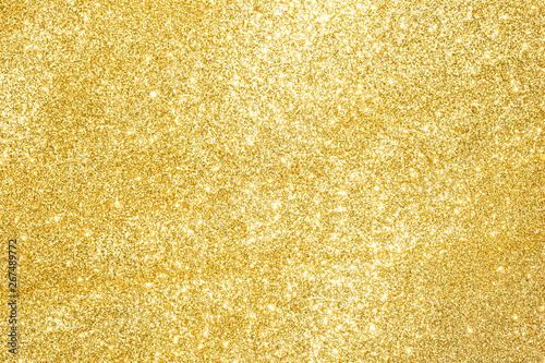 sparkles of golden glitter abstract background 