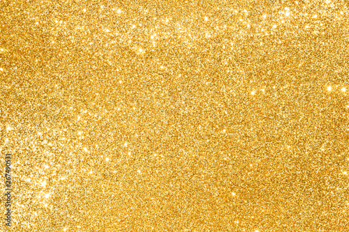 sparkles of golden glitter abstract background 