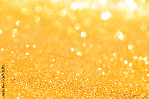 sparkles of golden glitter abstract background	