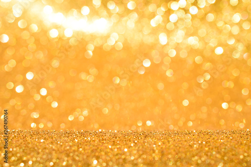 sparkles of golden glitter abstract background 