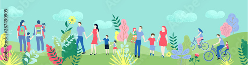 Family holiday. People with kids spend weekend outdoors, walking in city park.