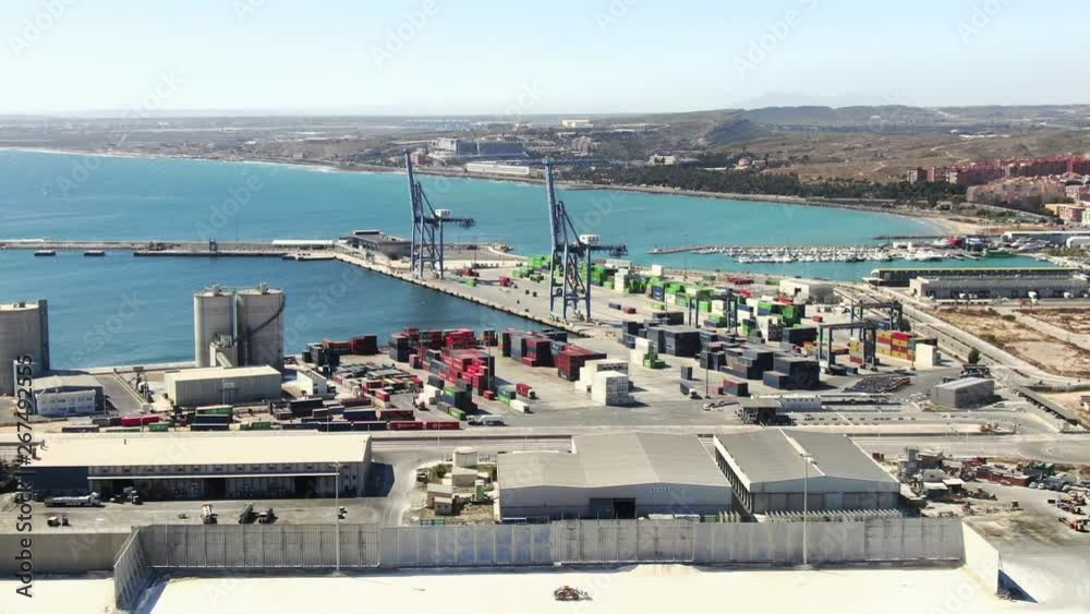 Urban developed sea port logistics of Alicante city Spain, drone wide shot Urban developed sea port logistics of Alicante city Spain, drone wide shot