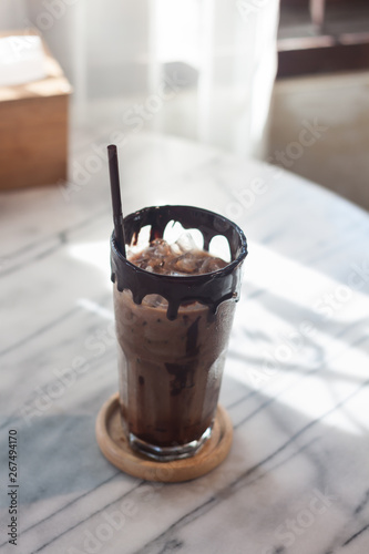 Ice coffee on wooden table