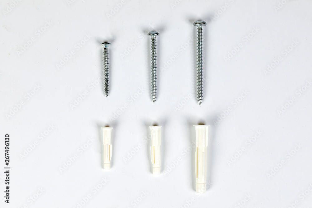 Fototapeta premium Metal screw plug on white background