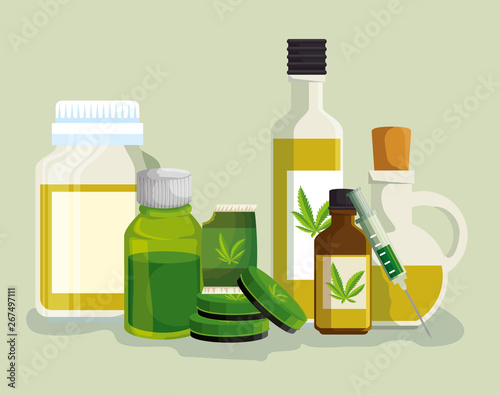 cannabis oil in the crystal bottles with medicine ointment and syring