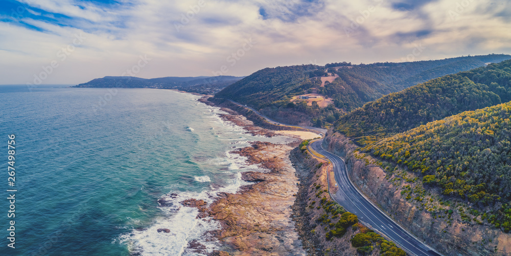Great Ocean Road passing through scenic landscape in Victoria, Australia