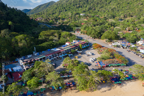 Aerial View From Flying Drone Of People Crowd Relaxing On Beach In Cambodia - Image in Kampot - Cambodia