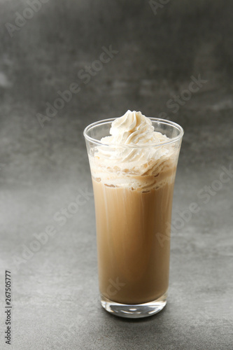 ice Viennese coffee in a glass on a grey background