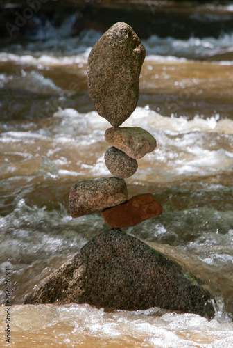 stones balancing in ranging river