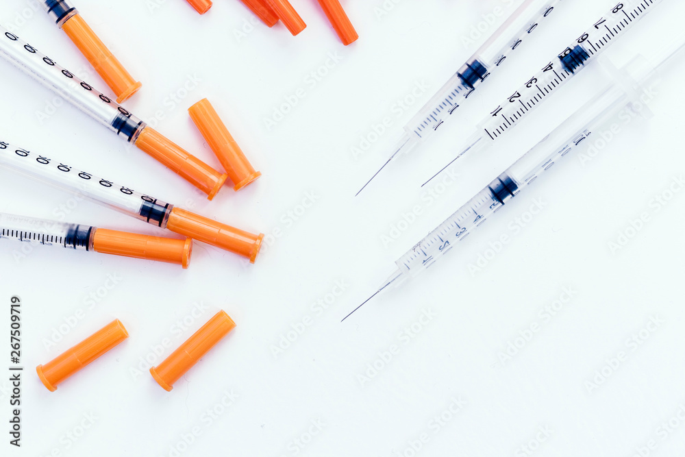 Pile of medical syringes for insulin for diabetes .
