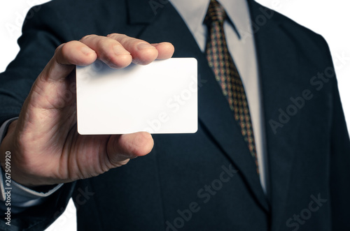 Businessman showing blank credit card , Isolated on white background