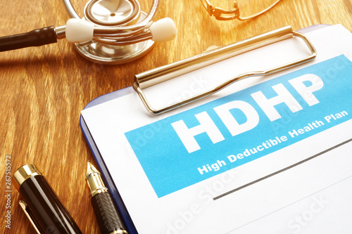 High Deductible Health Plan HDHP with clipboard.