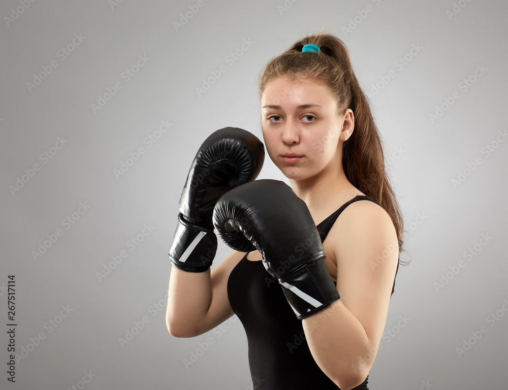 Young female kickboxing fighter Young female kickboxing fighter