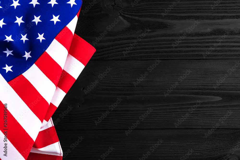 Obraz premium American flag on a black wooden