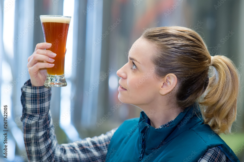 woman tasting beer woman tasting beer