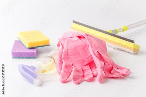 Spring cleaning background with space for copy text. Cleaning up tools. Plastic spray, sponge, gloves and desinfectant products