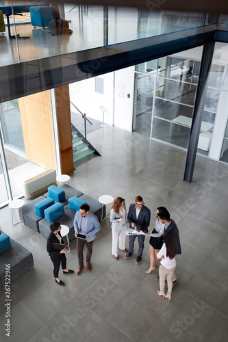 Картината върху платно Business people working together in office hall.