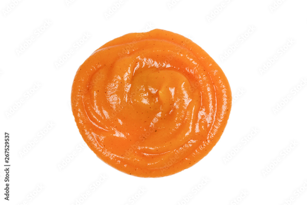 Orange sauce splashes isolated on white background Orange sauce splashes isolated on white background