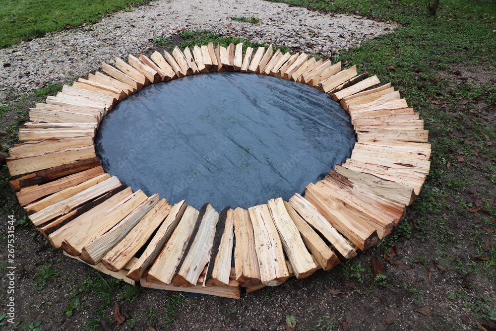 Fototapeta premium first layer of round wood pile