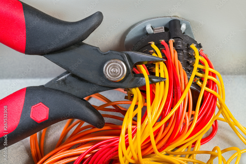 Diagonal cutting pliers detail. Parallel cables on mechanic rotary