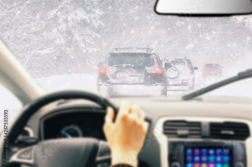 Fototapeta Naklejka Na Ścianę i Meble -  fast car on winter road and snow splash