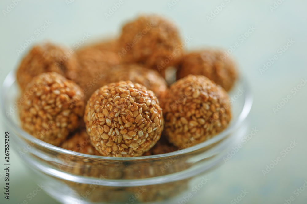 Pile of handmade Tilgul Laddu , sesame seeds for Makar Sankranti festival, Pile of handmade Tilgul Laddu , sesame seeds for Makar Sankranti festival,