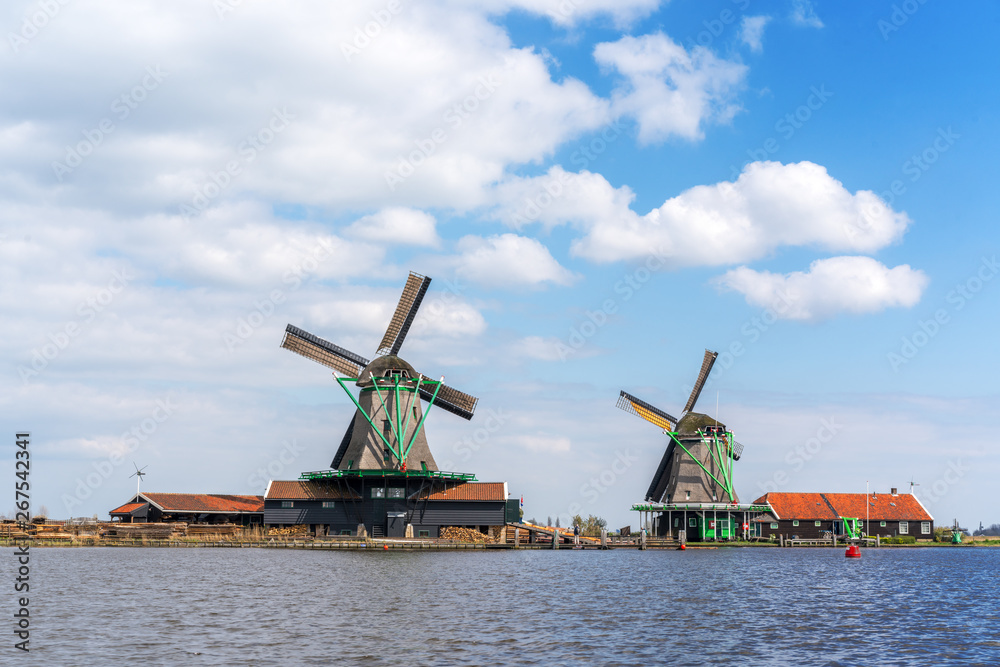 Historic Dutch Windmill in Zaanse Schans on the Zaan River in the Netherlands