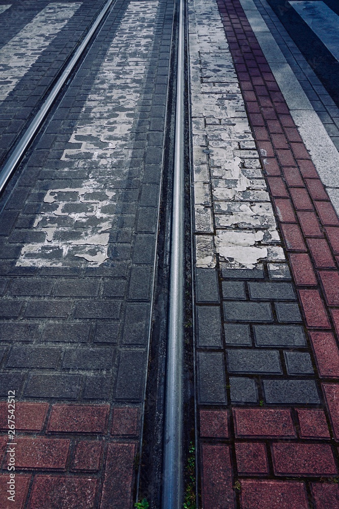 tramway tracks on the asphalt in the street in Bilbao city Spain tramway tracks on the asphalt in the street in Bilbao city Spain