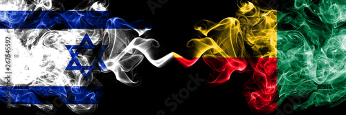 Israel vs Benin, Beninese smoky mystic flags placed side by side. Thick colored silky smokes flag of Israel and Benin, Beninese