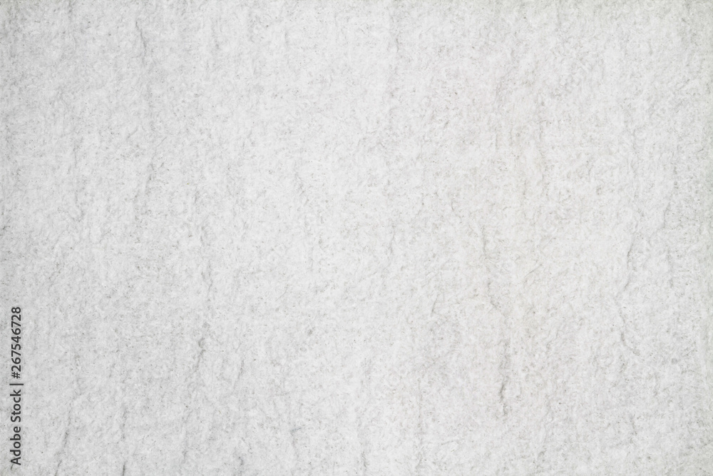 Fototapeta premium A rough texture background of white watercolour paper
