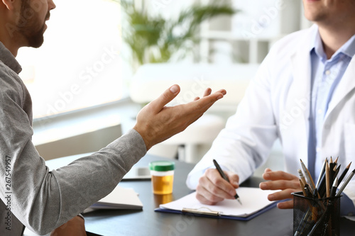 Male patient at urologist's...