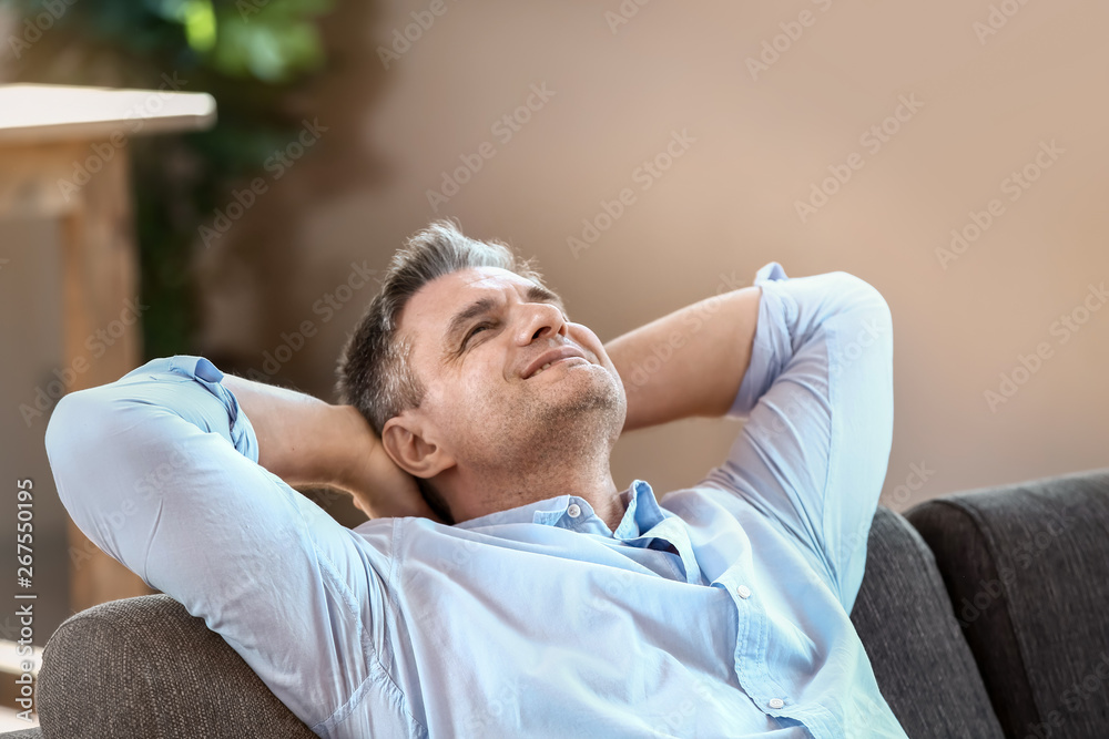 Handsome mature man resting at home Handsome mature man resting at home