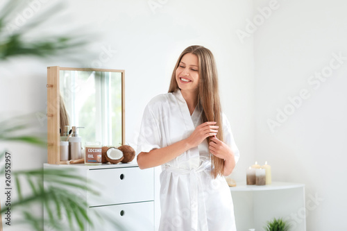 Beautiful young woman apply...