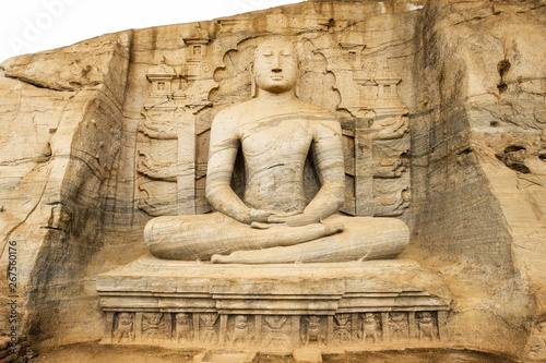 Stunning view of the beautiful Samadhi statue carved in stone. The Samadhi Statue is a statue situated at Mahamevnawa Park in Anuradhapura, Sri Lanka. photo