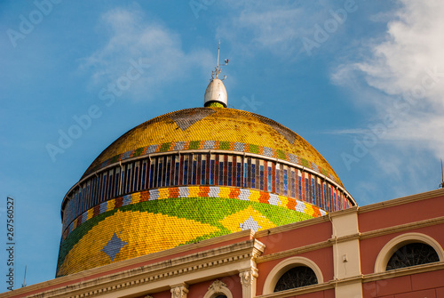 Stunning Colorful Manaus Opera House, Famous One Day Excursions. One Most Beautiful Building With a Minted Brazilian Flag in Exterior Rotunda. Manaus, Amazonas, Brazil photo
