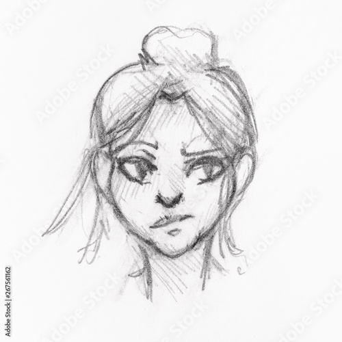 head of girl with skeptical face and bun hairstyle