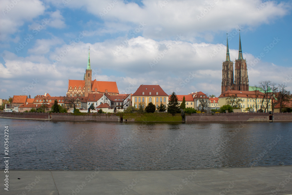 Panorama of the historical Polish city Wroclaw and reflection in the Odra River, Wroclaw Embankment.