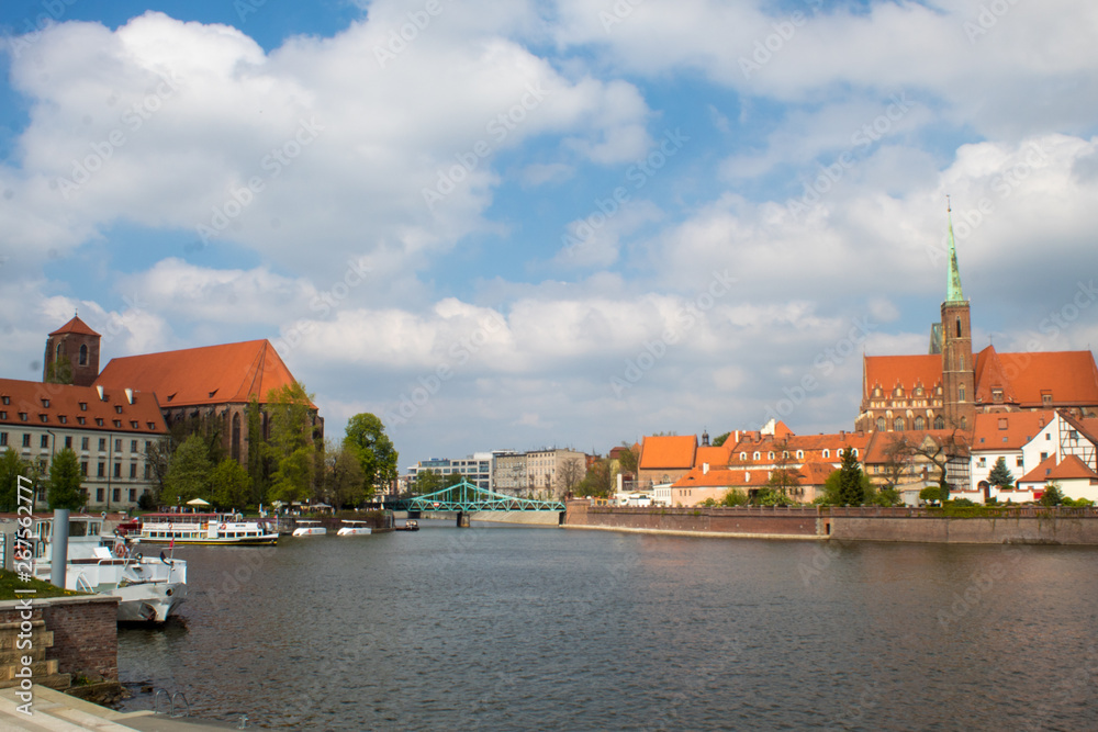 Panorama of the historical Polish city Wroclaw and reflection in the Odra River, Wroclaw Embankment.