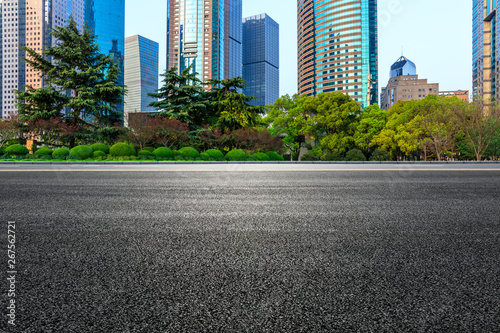 Shanghai modern commercial office buildings and empty asphalt road © ABCDstock