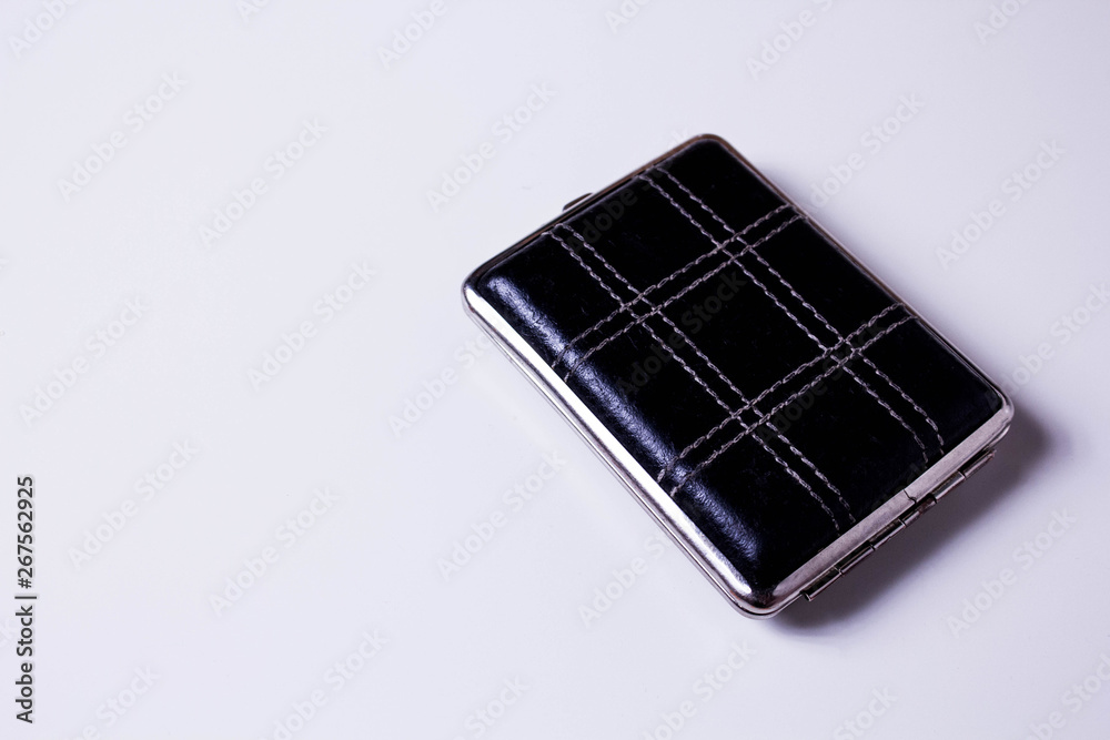 black cigarette case on the white background black cigarette case on the white background