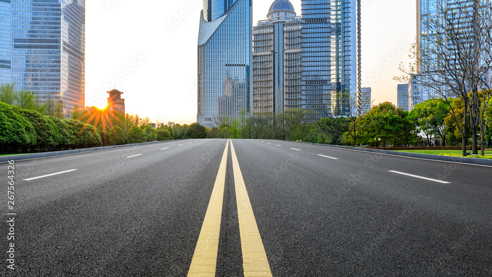 Shanghai modern commercial office buildings and empty asphalt highway