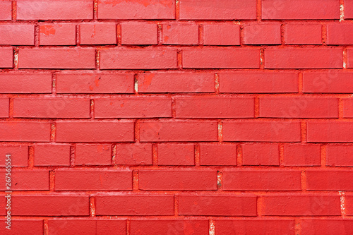 Brick wall painted red. Texture. Background.