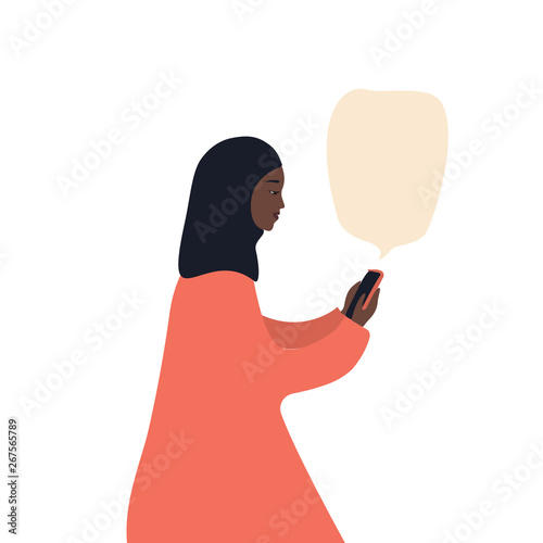 Wallpaper Mural Beautiful african-american woman in a hijab with a smartphone, flat vector illustration on white background Torontodigital.ca