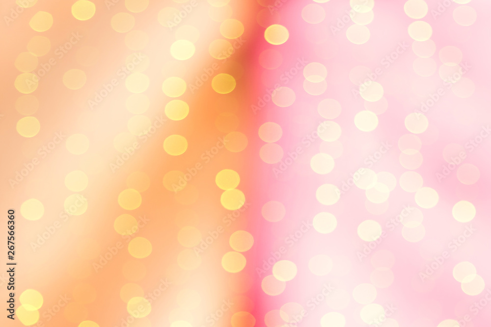 Abstract duotone blurred background with sparkling golden light bokeh. Festive orange and pink coral backdrop Abstract duotone blurred background with sparkling golden light bokeh. Festive orange and pink coral backdrop