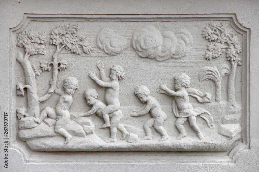 bas-relief on a base at the garden of the lower belvedere in Vienna (Austria)
