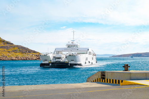 Car ferry boat in Croatia linking the island Rab to mainland. photo