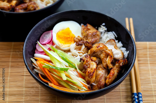 Grilled chicken thighs with rice, egg and pickled vegetables