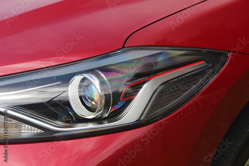 Red vehicle headlight with details