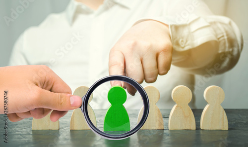 Woman leader chooses the person in the the team. Human Resource Management. Talented worker. Hiring staff. Employee search. Promote. Choosing a new leader in the team. Dismissal. Successful choice.