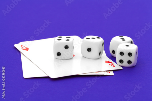 playing cards and dice on table